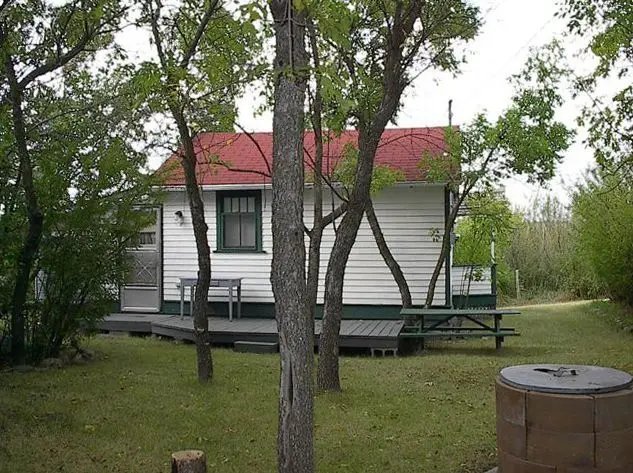 Mitchell cottage with deck and trees